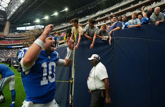 Indianapolis Colts quarterback Gardner Minshew II (10) cheers as he leaves the field Sunday, Sept. 17, 2023, after the team defeated the Houston Texans, 31-20, at NRG Stadium in Houston.